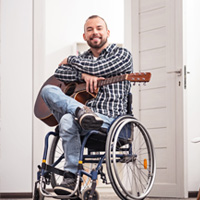 Man sat on wheelchair Lift